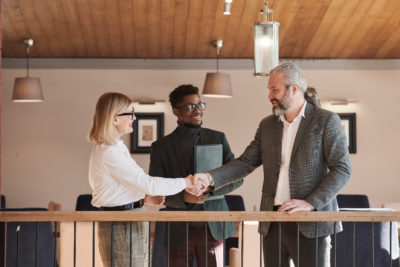 business handshake real estate client