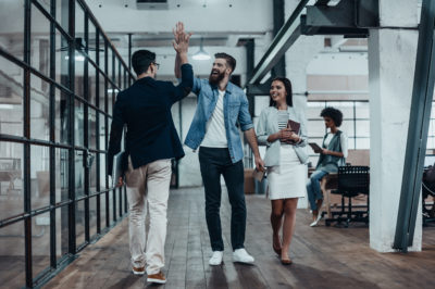 high five for meeting real estate career goals